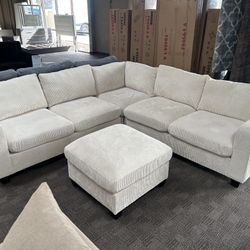 Cream Beige Sectional And Ottoman 