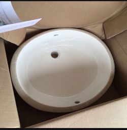 American Standard Ovalyn under mount vanity sink in white.  21-1/4 by 17-3/8