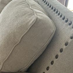 A Beautiful couch ! Linen With Nail Head Trim.