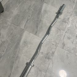 Brand new in wrapper ez curl barbell bar for Olympic weights plates Have other new exercise equipment on my page for s