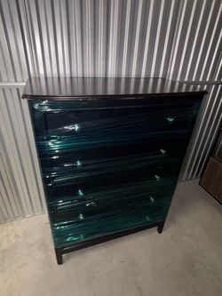 Tall black dresser