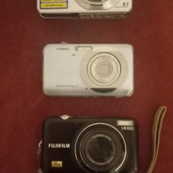 3 Older Cameras Nice! Will Sell Seperate.