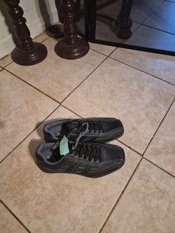 Black Low-Top Sneakers with Tags