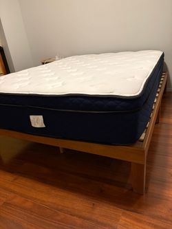 Full sized solid wood bed frame