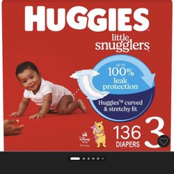 half a box of size 3 huggie diapers.