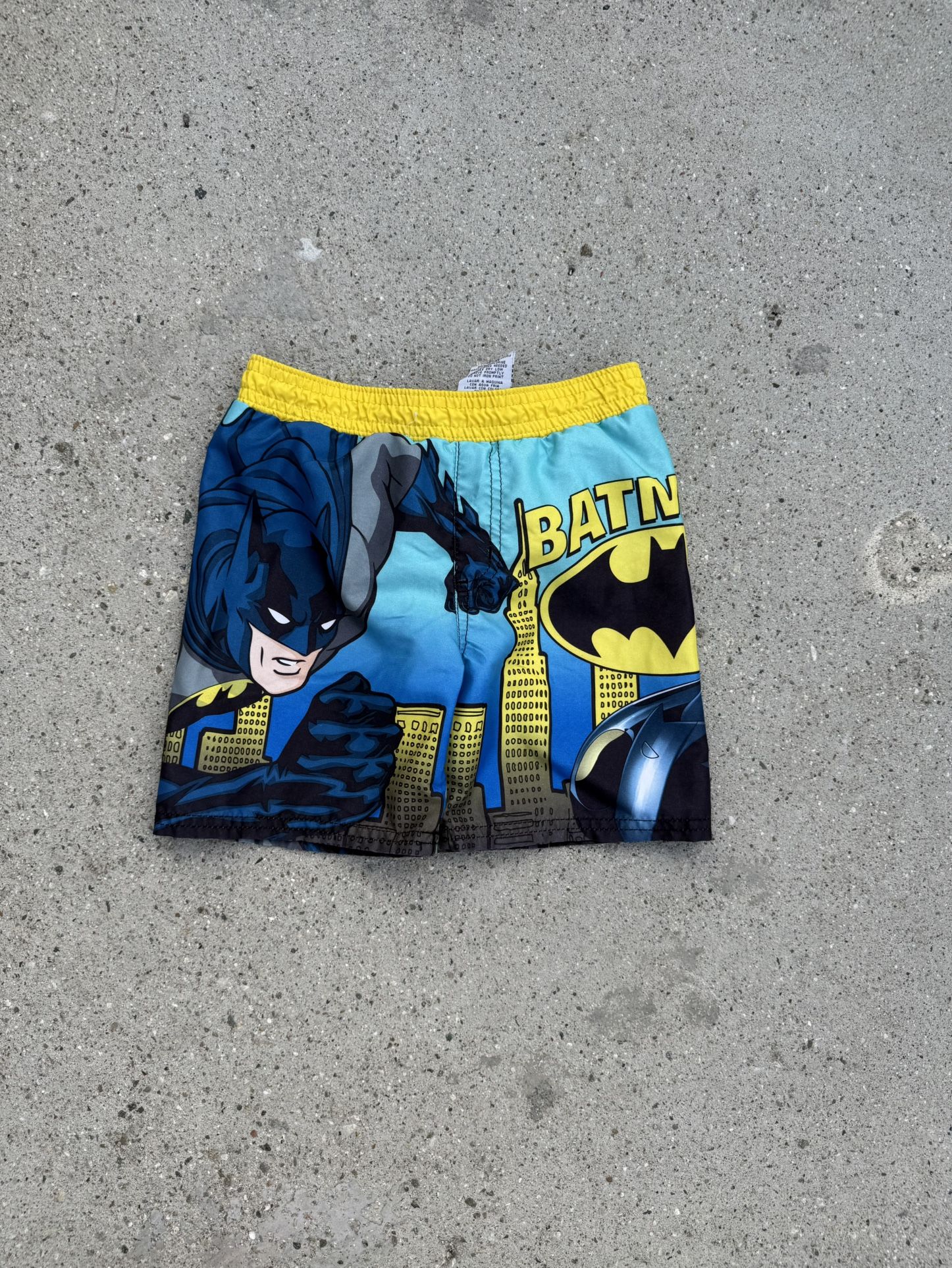 Blue and yellow Batman swim trunks size 2T