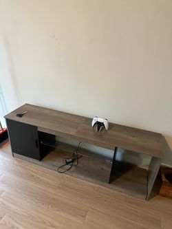 Partially broken tv stand