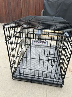 30” Precision Dog Puppy Crate  front and side entrance  Like new. 8 months old Originally cost $74 inc tax.