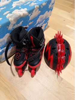 ROLLERBLADES & HELMET, for a small boy, maybe 5-6; cross streets are Arapaho & Waterview