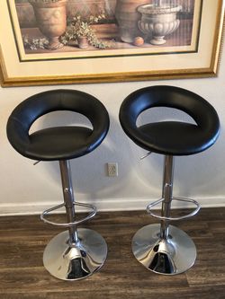 2 Black Leather counter height barstools $ 30 each