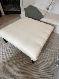 Tufted white ottoman