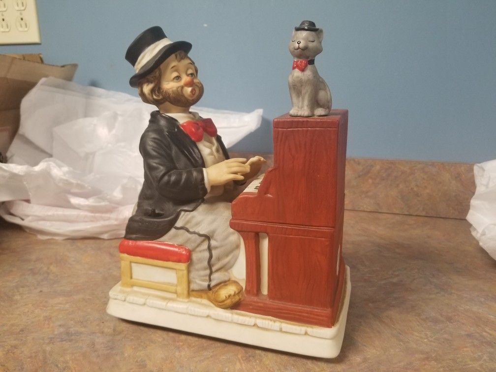 Rare Clown and Piano Melody in Motion Hand Painted and Made Porcelain Figure