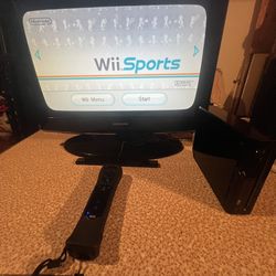 Black Wii With Wii Sports And Sonic Game