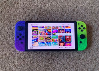 Nintendo Switch OLED with 100 POPULAR SWITCH Games