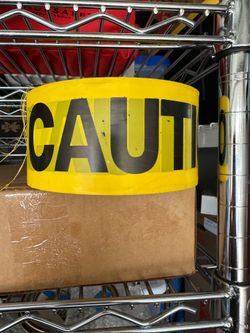 CAUTION TAPE , roll of yellow caution