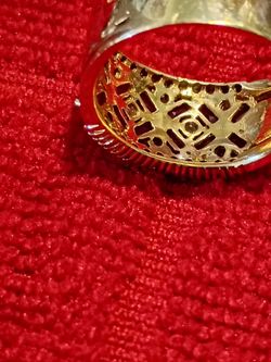 14kt Ruby and diamond banda ring size 9
