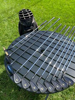 Golf clubs and bag ( may need grips)
