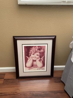 Cross Stitched In A Frame