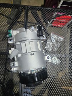 AC COMPRESSOR