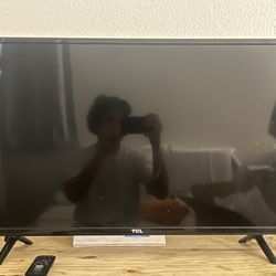 TCL ROKU Smart TV And ROKU Streaming Device