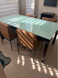 Dining room table with four chairs. Cost me over $1400 in el dorado. Practically new make me descant offer come pick it up
