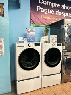 LG 4.5 Cu Ft Washer And 7.4 Cu Ft Dryer With Pedestals White