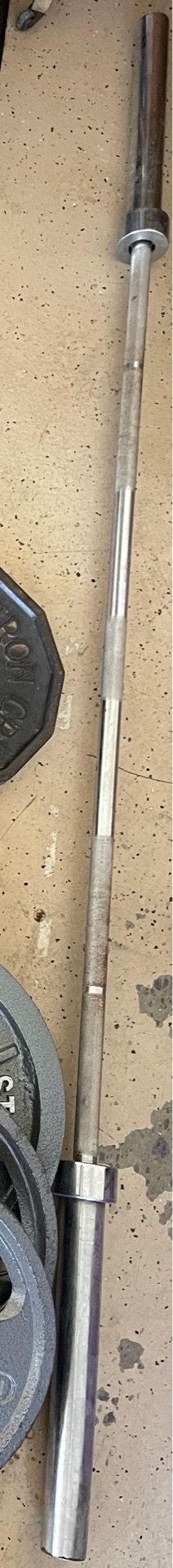 Olympic barbell weighs 45 pounds (20 kg)