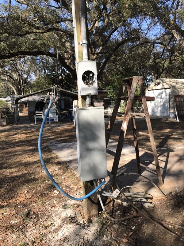 GE 200 amp service breaker box & pole weather head