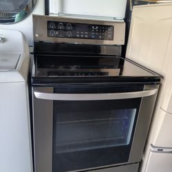 L/G Glass Top Stove Stainless Steel Everything Works Good 
