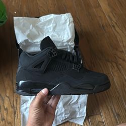 Black Cat Jordan 4 