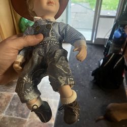 Porcelain cowboy doll