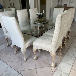 Glass dining table with stone base