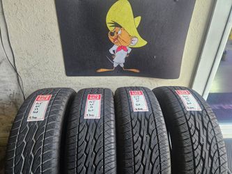 205/65/15 Dunlop Tires (4)