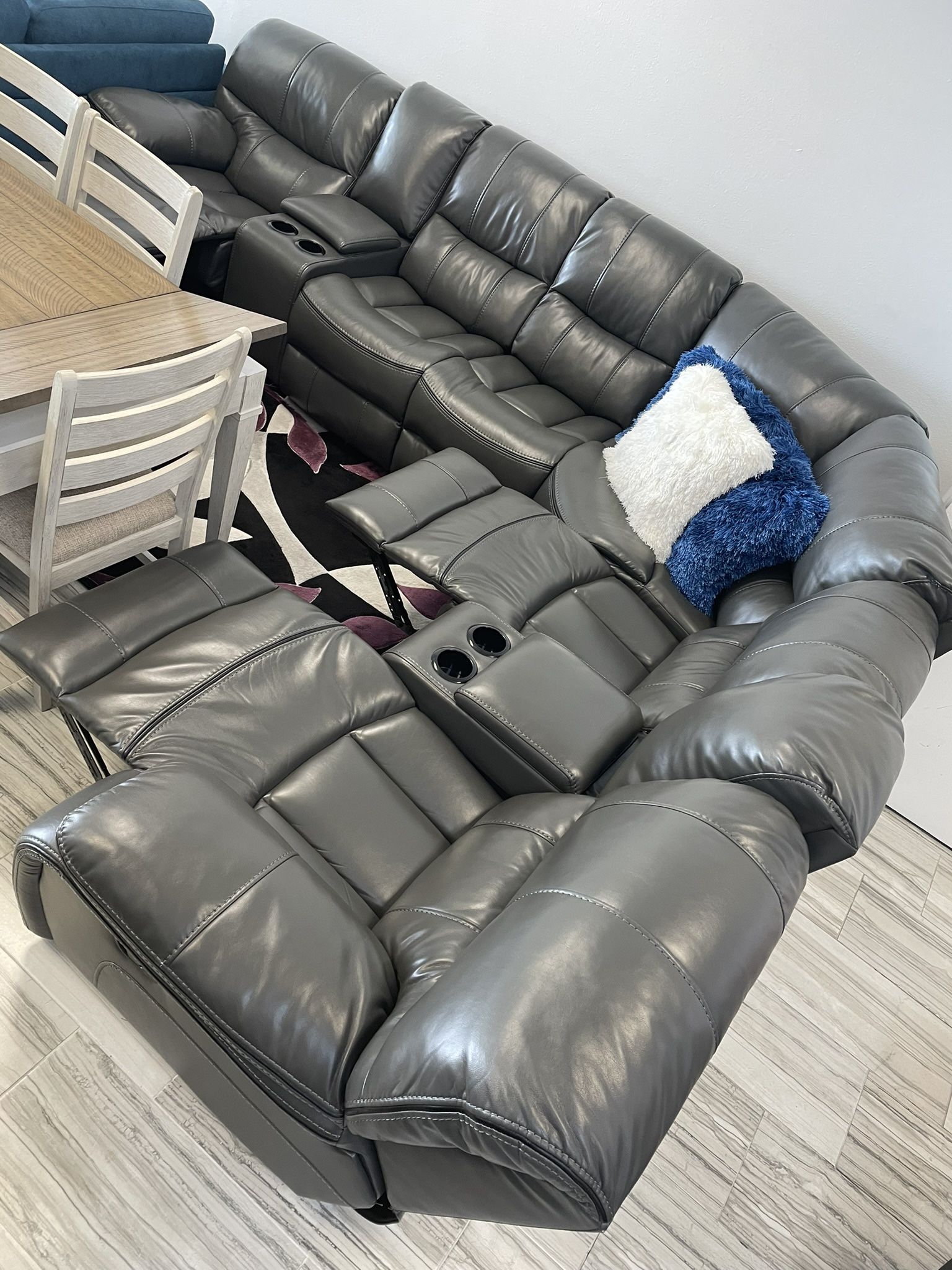 Going out of business sale. Madrid gray leather reclining sectional now $1599. Easy finance option. Same day delivery.