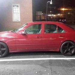 Red E320 Mercedes Benz