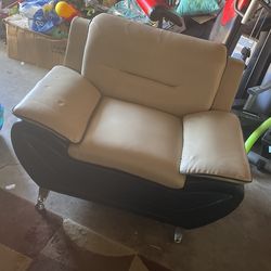Beige and black leather chair