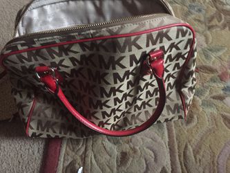 Slightly used Mk women's canvas and leather bag