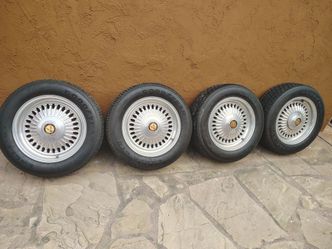 Four wheels spoke  looking aluminum wheels