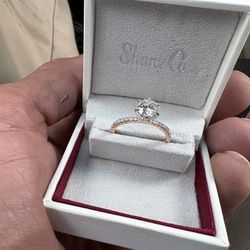 1 And 1/3 carat diamond engagement ring.