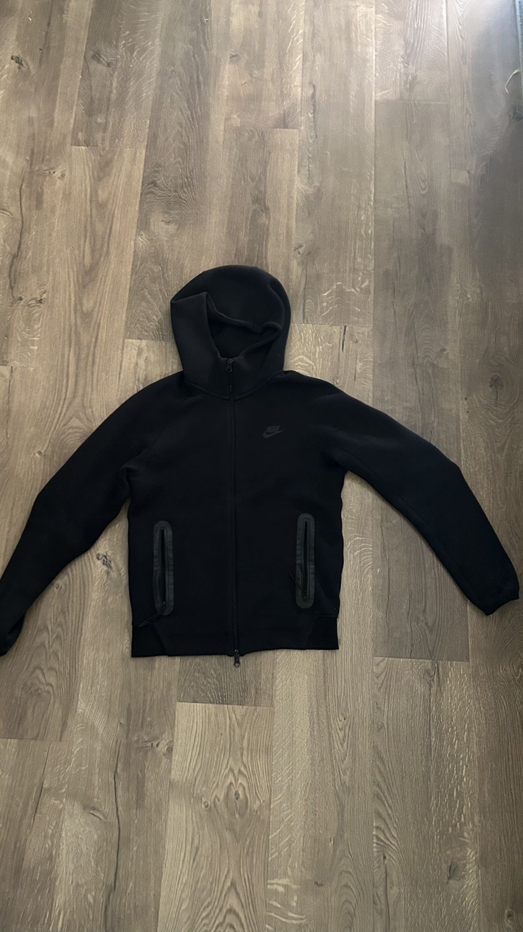 All black Nike Tech