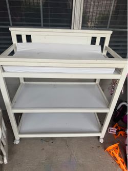 White baby changing station