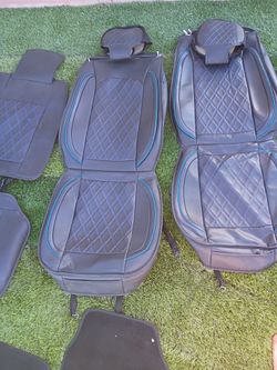 Black with blue car seat covers.