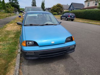 1994 ,4door Geo Metro Compact Car – Blue
