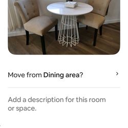 Round table and two chairs