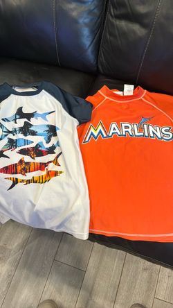 Boy swim shirts 👕 size 10