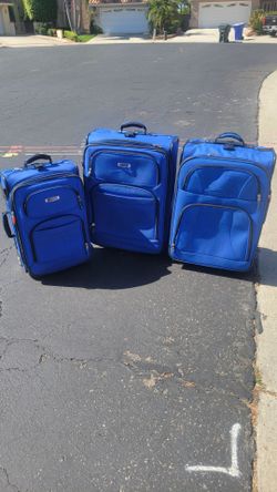 Delsey lightweight blue suitcase set