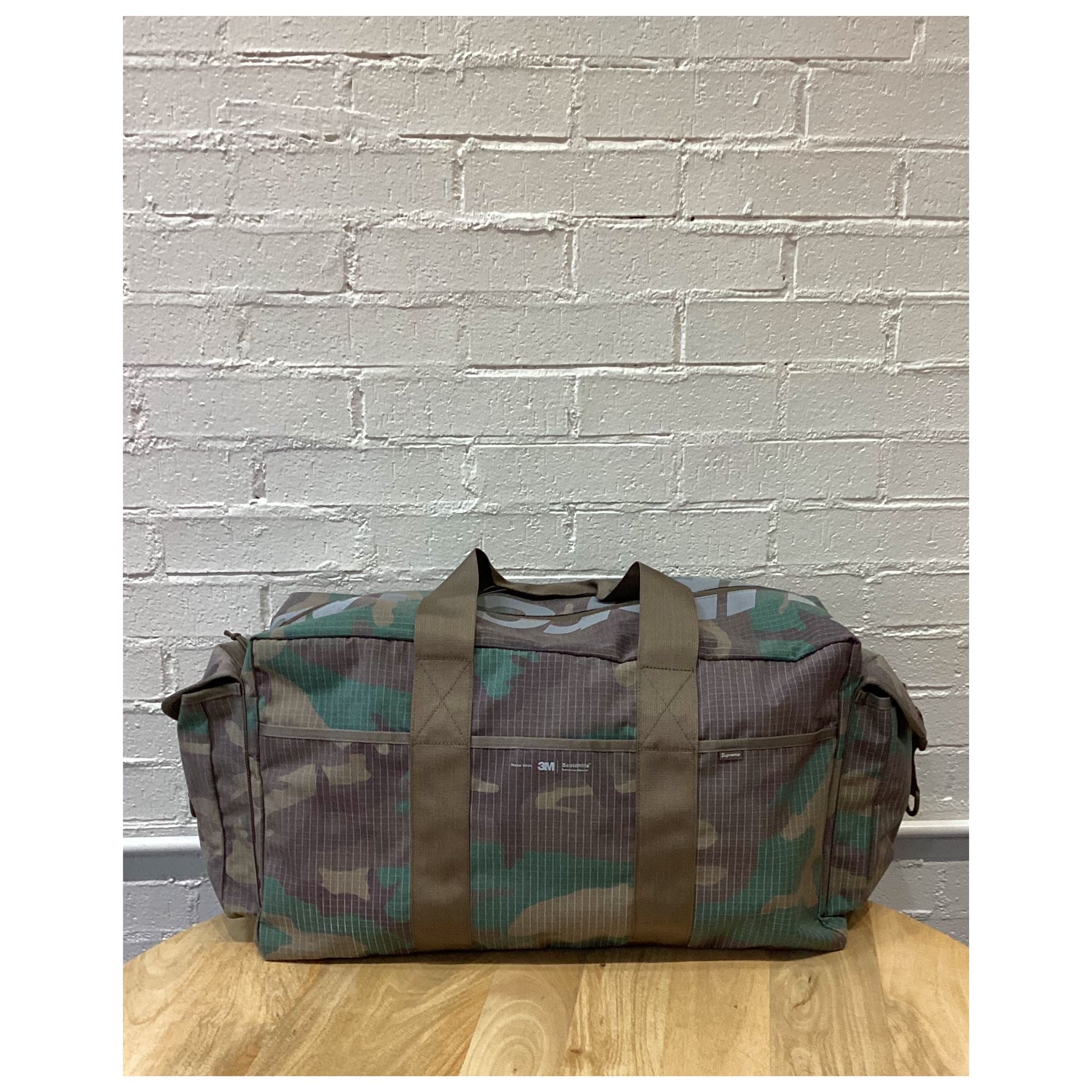 SUPREME DUFFLE BAG SS24 - WOODLAND CAMO for Sale in Los