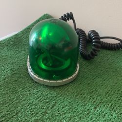 Old Style Revolving Green light 