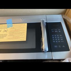 Brand New In The Box GE Over the range microwave