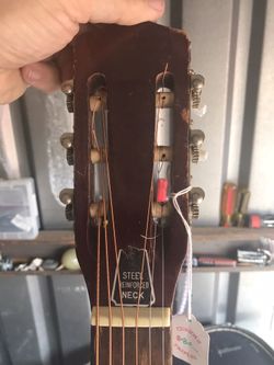 Steel reinforced 2024 neck acoustic guitar